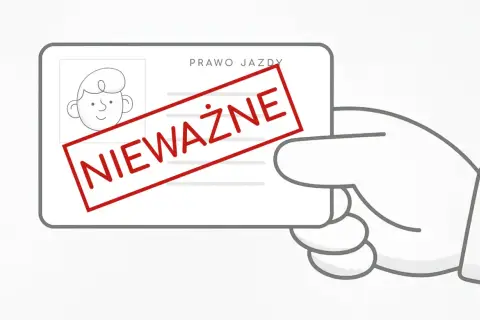 Ręka trzyma nieważne prawo jazdy. Taka sytuacja może skutkować mandatem za brak uprawnień do kierowania pojazdem.