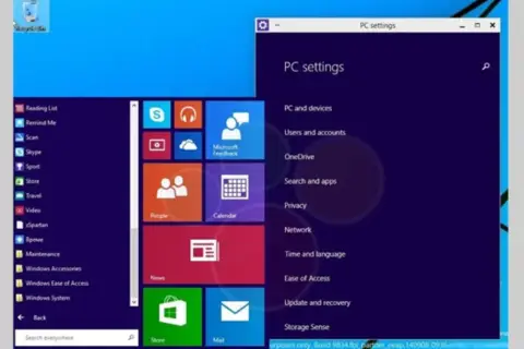 Ekran startowy Windows 9 z kafelkami aplikacji i menu ustawień PC.