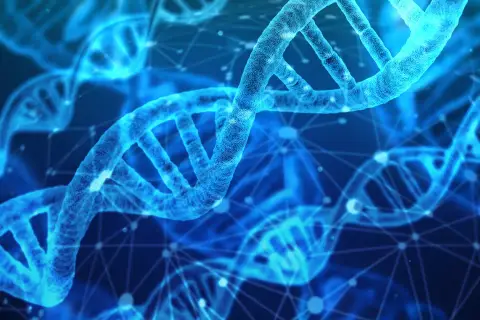 Błękitne, świetliste helisy DNA, symbolizujące postęp w nauce i scjentyzm, unoszą się w cyfrowej przestrzeni.
