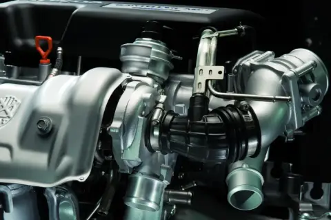 Detale turbosprężarki w silniku diesla. Zastanawiasz się, przy jakich obrotach załącza się turbina w dieslu? Ten element jest kluczowy dla mocy.