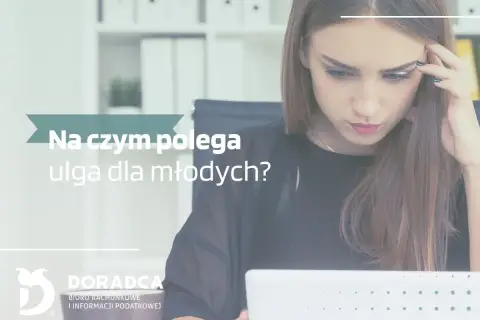 Młoda kobieta zamyślona nad ulgą dla młodych. Biuro rachunkowe Doradca wyjaśnia zawiłości podatkowe.