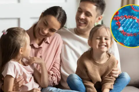 Szczęśliwa rodzina z dziećmi, obok której widnieje symbol DNA, sugerujący dziedziczna choroba krwi.