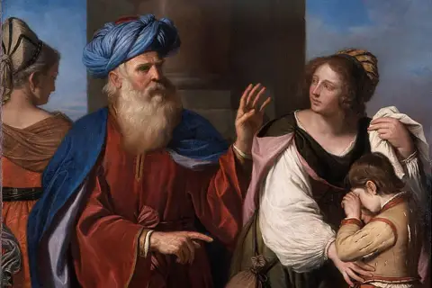 Starzec w niebieskim turbanie, syn Abrahama, wskazuje palcem na płaczące dziecko. Kobieta obok próbuje je pocieszyć.