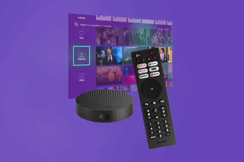 Nowoczesny dekoder i pilot PLAY, idealne do oglądania ulubionych seriali i filmów. UPC Polska oferuje bogactwo kanałów.
