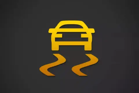Icono de coche amarillo con líneas curvas debajo, indicando un fallo sistema esc.