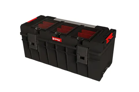 Czarna skrzynka narzędziowa Qbrick System Pro 600 z czerwonymi przegródkami i przezroczystą pokrywą.