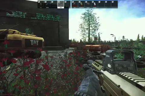 Gracz celuje z karabinu MDR w grze Escape from Tarkov. W tle widać żółty pojazd z napisem "TAT" i zniszczone otoczenie, idealne na nowy tarkov wipe.