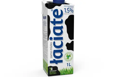 Karton mleka 1,5% tłuszczu, z napisem "laciate" i wzorem w krowie łaty. Idealne mleko po francusku na śniadanie.