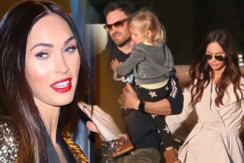 Megan Fox z dziećmi, w tym małym chłopcem niesionym przez mężczyznę.