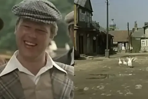 Uśmiechnięty Piotr Grabowski w kratkę, obok wiejska sceneria z gęsiami. Pytanie "piotr grabowski na co zmarł" pozostaje bez odpowiedzi.