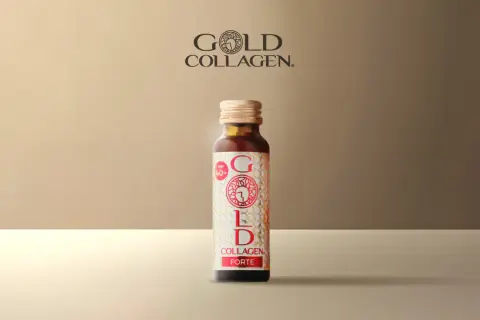Botella de Gold Collagen Forte. Consulta los efectos secundarios antes de usar.