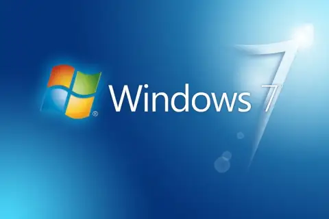 Logo Windows 7 na niebieskim tle. Klasyczny wygląd systemu, który wielu wspomina z sentymentem.