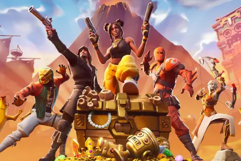 Postacie z gry Fortnite przy skrzyni pełnej skarbów. Idealne dla graczy szukających darmowe gry na PS4.
