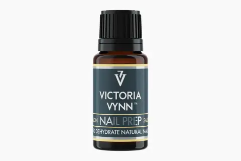 Buteleczka Victoria Vynn z produktem Nail Prep, który służy do dehydratacji naturalnych paznokci.