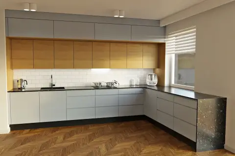 Nowoczesna kuchnia z drewnianymi frontami, szarymi szafkami i czarnym blatem. Idealne maskowanie szczelin przy meblach zapewnia czysty wygląd.