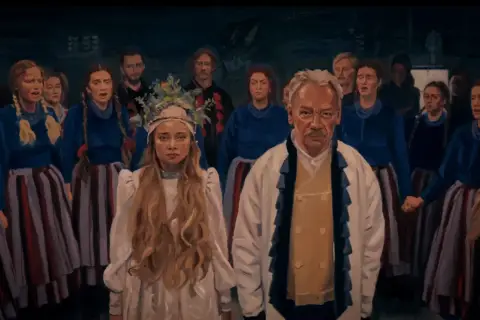 Grupa ludzi w tradycyjnych strojach, z młodą kobietą w białej sukni i wianku na czele. W tle widać innych mężczyzn i kobiety, przypominających **chłopów** z dawnych czasów.