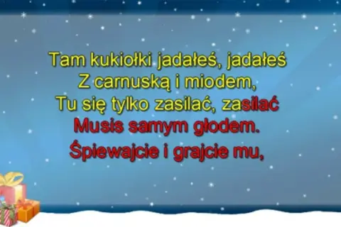 Śnieżna sceneria z prezentami i tekstem piosenki: "Tam kukiołki jadałeś... Śpiewajcie i grajcie mu".
