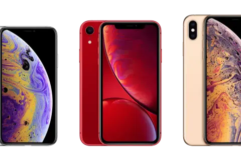 Trzy telefony iPhone: biały, czerwony i złoty. Złoty iPhone XS Max ma wymiary idealne do dłoni.