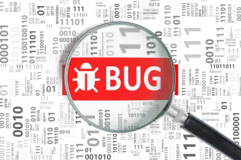 Lupa powiększa symbol owada i napis "BUG", wyjaśniając, czym jest debugowanie.