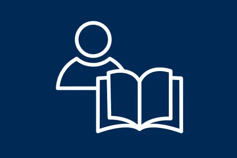 Eine Person mit einem offenen Buch. Das Symbol steht für die Definition von "lesen" und das Erlernen von Wissen.