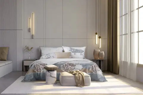 Elegancka sypialnia w stylu hotelowym z łóżkiem, ozdobnym pledem i nowoczesnymi lampami.