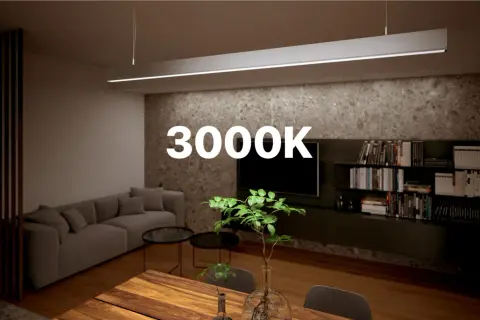 Nowoczesny salon z sofą, stołem i półkami. Ciepłe światło LED 3000K tworzy przytulną atmosferę.