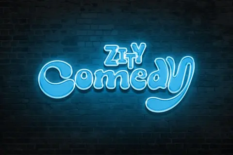 Letras de neón azul brillante que dicen "Zity Comedy" sobre un fondo de ladrillos oscuros.