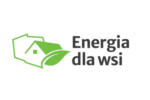 Zielony dom z liściem symbolizuje czystą energię dla wsi.