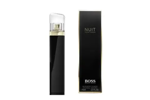 Elegancka, czarna perfumetka Hugo Boss Nuit Pour Femme z złotymi detalami i przezroczystą nakrętką. Obok stoi jej opakowanie.