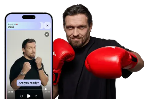 A boxer in red gloves, ready to throw down. The phone screen shows a video with the text "Are you ready?" - a real knockout!