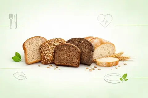 Różne rodzaje chleba, od jasnego po ciemny, z ziarnami. Zastanawiasz się, jaki chleb ma najmniej kalorii? Wybierz świadomie!