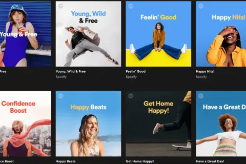 Spotify playlist curator showcases vibrant album art for playlists like "Young & Free," "Feelin' Good," and "Happy Hits!