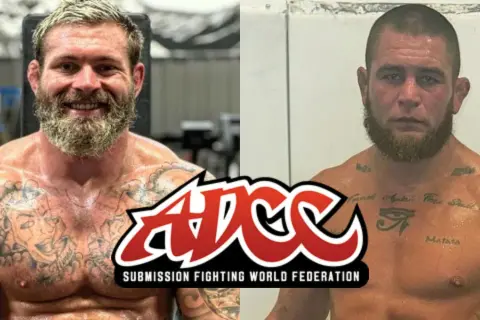 Två brottare, en med skägg och tatueringar, den andra med kort hår och skägg. En logotyp för ADCC Submission Fighting World Federation syns mellan dem. Gordon Ryan är en av dem.