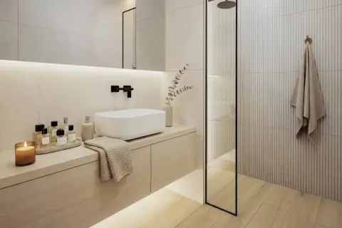 Elegancka łazienka z prysznicem, gdzie nowoczesny design spotyka się z naturalnymi materiałami.