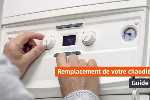 Main tenant un bouton de réglage sur une chaudière. Un guide complet sur le changement de chaudière fioul.