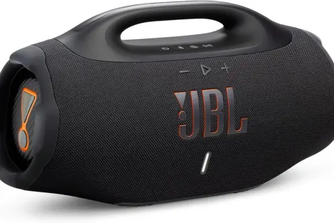 Enceinte JBL noire avec logo orange. Apprenez comment allumer une enceinte JBL pour profiter de votre musique.