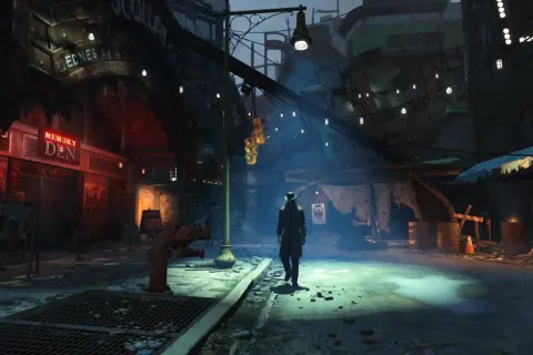 Postapokaliptyczna ulica w Fallout 4, gdzie samotny podróżnik, być może jeden z towarzyszy, przemierza mroczne zaułki.