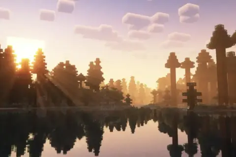 Piękny wschód słońca w Minecraft z promieniami przechodzącymi przez drzewa. Chcesz wiedzieć, jak wgrać shadery do Minecraft, by uzyskać taki efekt?