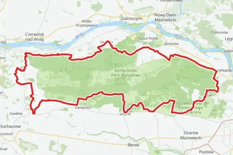 Mapa przedstawia przebieg kampinoskiego szlaku rowerowego, otaczającego zielony obszar Kampinoskiego Parku Narodowego, w pobliżu Wisły i miejscowości takich jak Zakroczym czy Nowy Dwór Mazowiecki.