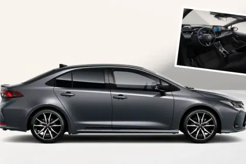 Szary sedan Toyota Corolla 2026 z nowoczesnym wnętrzem.