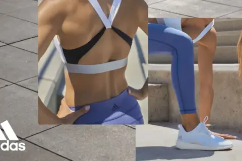 Kobieta w sportowym stroju, w tym bielizna adidas, ćwiczy na zewnątrz.