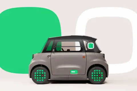 Szary Citroen Ami z zielonymi akcentami i ikoną baterii. Sprawdź atrakcyjną citroen ami cena.