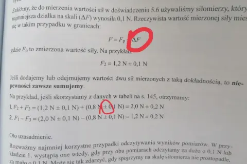 Fragment tekstu z fizyki z zaznaczonym symbolem ΔF i równaniami.