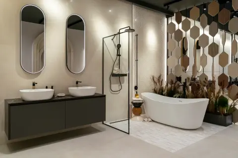 Une salle de bain zen avec double vasque, douche à l'italienne et baignoire îlot. Ambiance apaisante et naturelle.