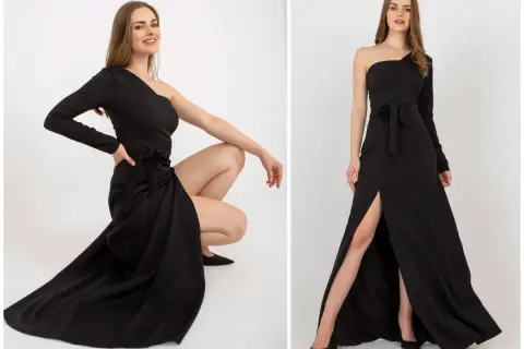 Elegancka, czarna sukienka wieczorowa z jednym rękawem i rozcięciem na nodze. Oryginalne sukienki wieczorowe dla każdej kobiety.