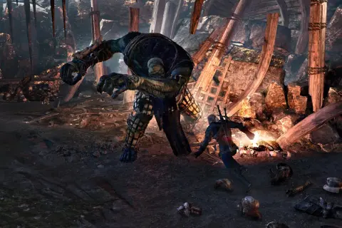 Geralt walczy z potworem w jaskini. Ile zajmuje przejście Wiedźmina 3? Zależy od stylu gry!
