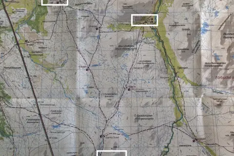 En detaljerad karta över fjällområdet Sylarna, med markerade leder, fjällstationer och höjder.