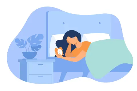 A woman in bed holds an alarm clock, wondering if 6 and a half hours of sleep is enough.