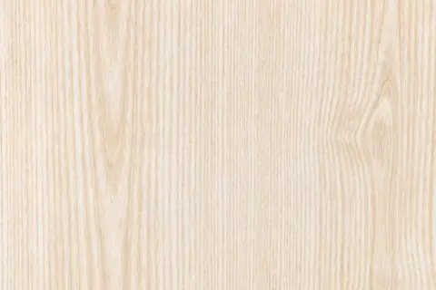 Texture naturelle de couleur bois frêne, aux veines fines et claires, évoquant la douceur et la pureté.