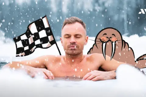 Mężczyzna w zimnej wodzie, z szachownicą i foką. Morsowanie daje hart ducha i odporność.